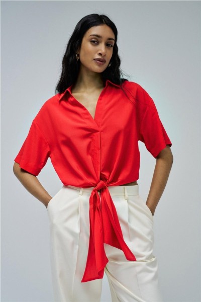 Camisa Salsa con lazo en el dobladillo