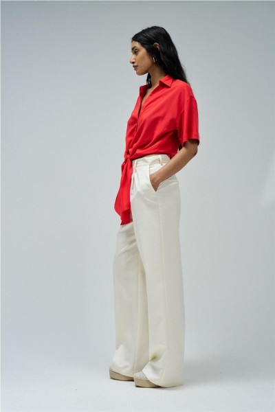 Camisa Salsa con lazo en el dobladillo