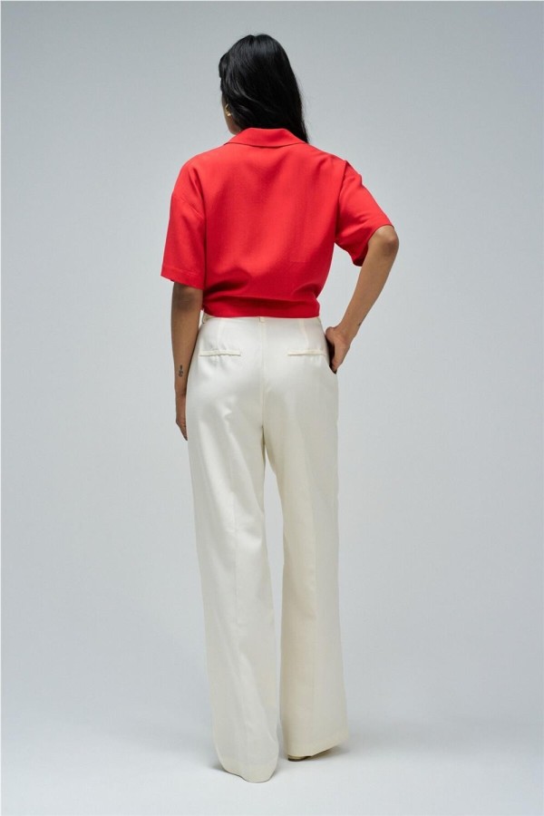 Camisa Salsa con lazo en el dobladillo