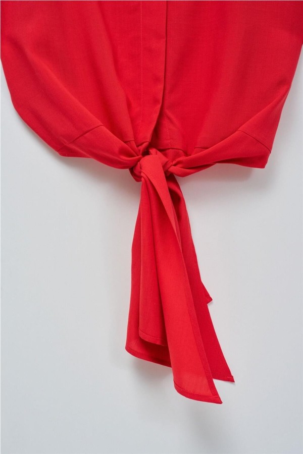 Camisa Salsa con lazo en el dobladillo