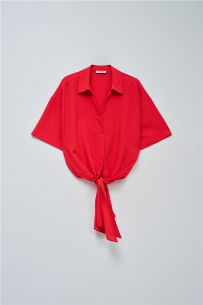 Camisa Salsa con lazo en el dobladillo