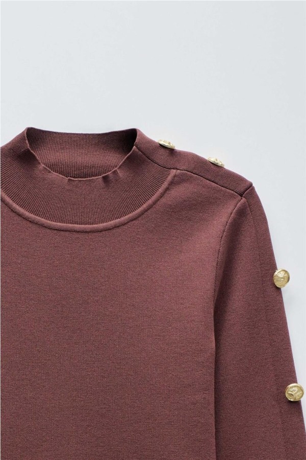 Jersey de punto con botones dorados