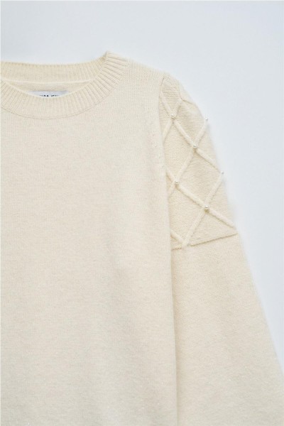 Jersey Salsa de punto con perlas